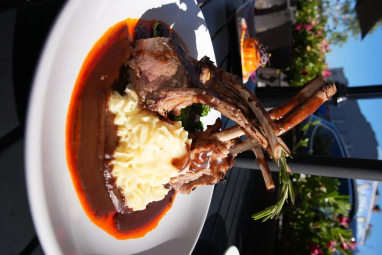 Rack of lamb served al fresco at Mezza Luna Bistro